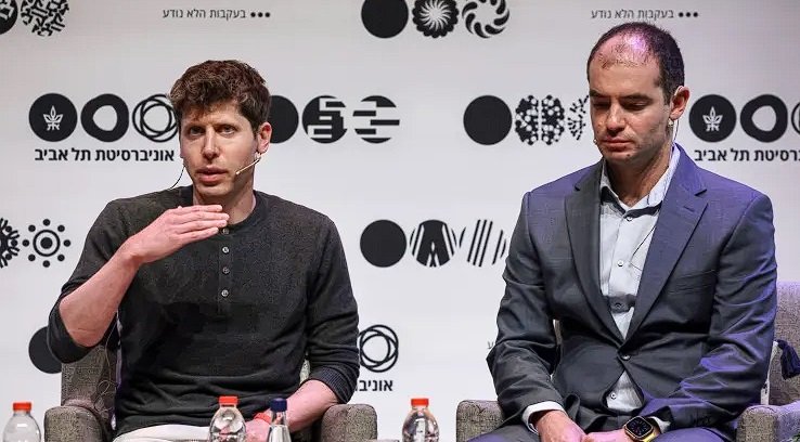 two men sitting in chairs