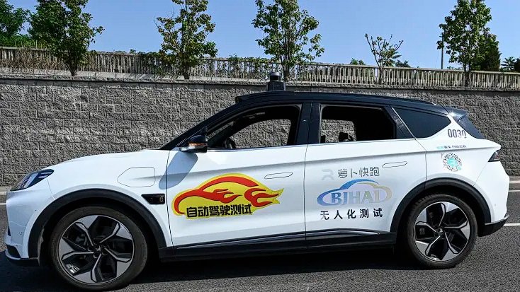 a white car with a black roof