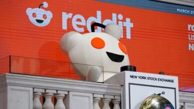 a large white stuffed animal on a balcony